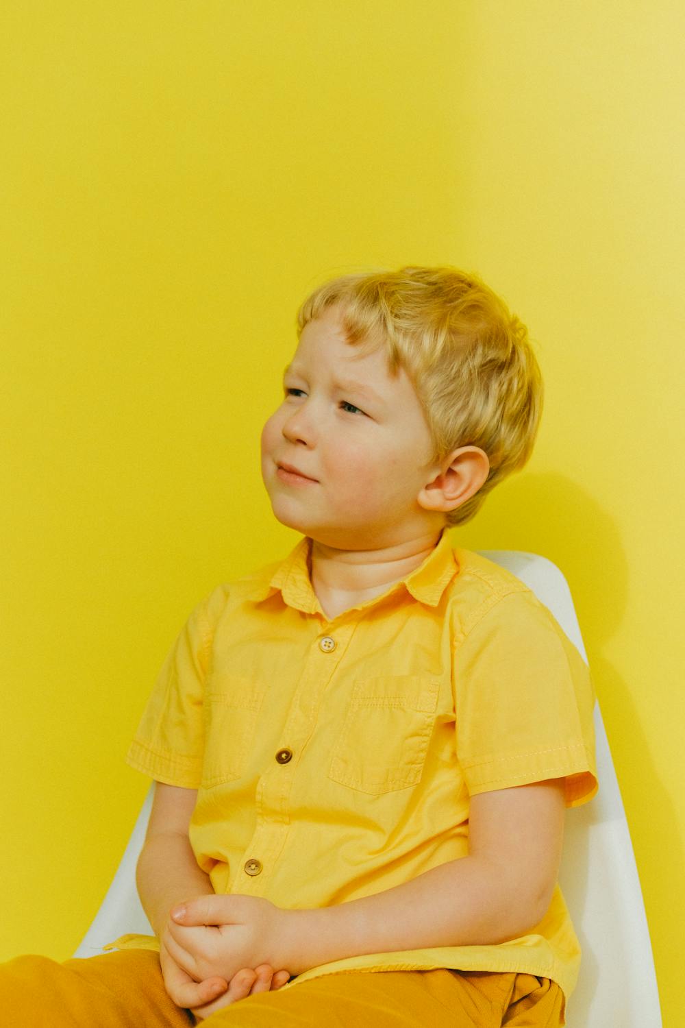 School age girl aged 6-7 in neat stylish everyday clothes