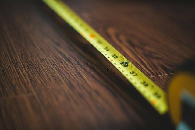 Close-up of measuring tape for kids clothing size guide