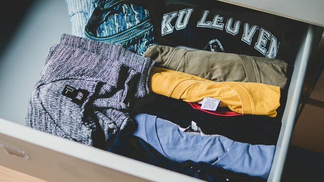 Neatly folded assorted pastel colored shirts for girls capsule wardrobe