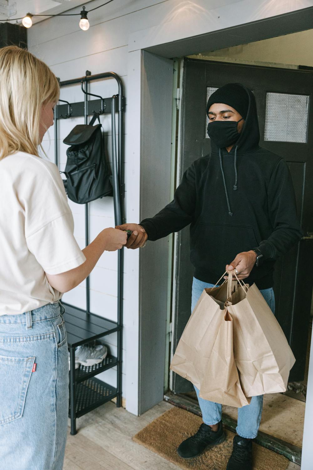 Online fashion shopping on phone with ecommerce clothing delivery